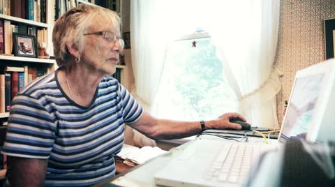 Senior Woman Using Computer for Online Live Video Chat at Home Stock Footage 51023937