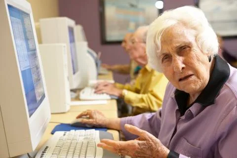 Senior woman using computer Stock Photos