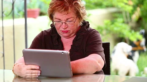 Senior Woman using Digital Tablet Stock Footage 50137842