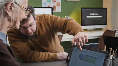 Senior Woman Using Spreadsheets in Computer Class for Seniors Stock Footage 333704384