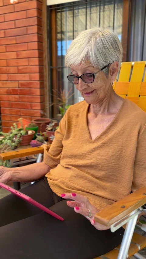 Senior woman using tablet Stock Footage 301804917