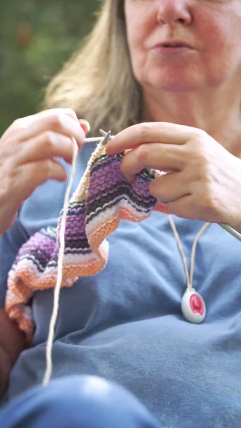 Senior woman's hands knitting Stock Footage 276891387
