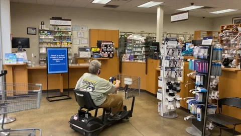 Seniors Arrive To The Pharmacy Stock Footage 154960460