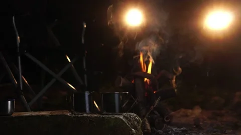 Seniors camping at night Stock Footage 222575404