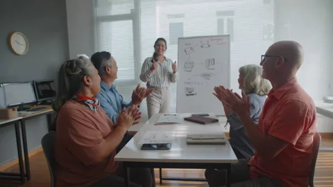 Seniors Clapping Hands and Thanking Teacher for Computer Class Stock Footage 263703291