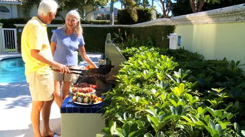 Seniors Cooking Healthy Food Stock Footage