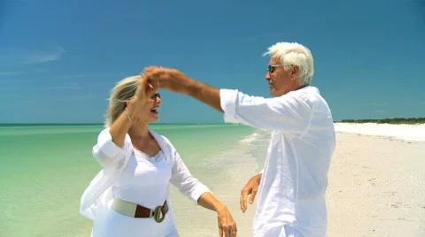 Seniors Dancing on the Beach 60FPS Stock Footage 735323
