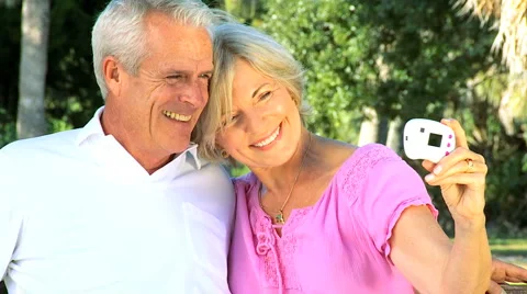 Seniors Fun Wih a Camera Stock Footage 980081