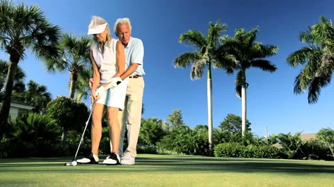 Seniors Golfing Lifestyle Stock Footage