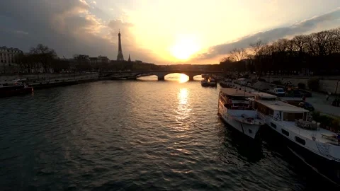 Senna River at sunset, Eiffel tower in the background Stock Footage 194953067