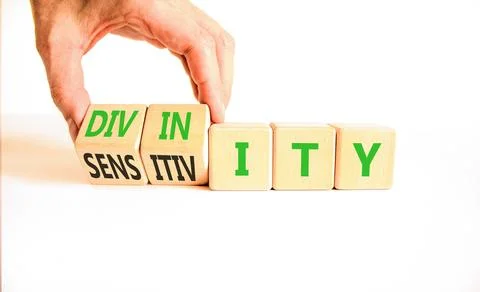 Sensitivity or divinity symbol. Concept words Sensitivity or Divinity on wo.. Fotos de archivo