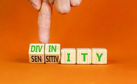 Sensitivity or divinity symbol. Concept words Sensitivity or Divinity on wo.. Fotos de archivo