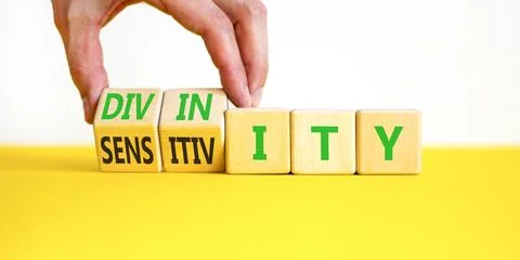 Sensitivity or divinity symbol. Concept words Sensitivity or Divinity on wo.. Fotos de archivo