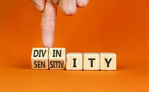 Sensitivity or divinity symbol. Concept words Sensitivity or Divinity on wo.. Fotos de archivo