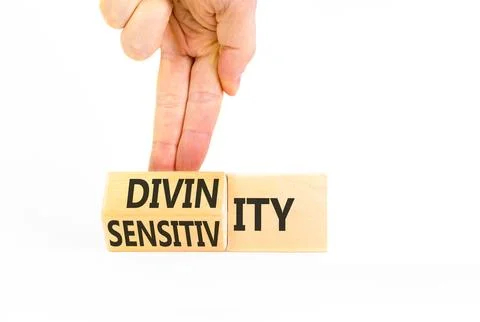 Sensitivity or divinity symbol. Concept words Sensitivity or Divinity on wo.. Fotos de archivo