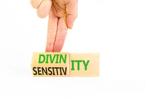 Sensitivity or divinity symbol. Concept words Sensitivity or Divinity on wo.. Fotos de archivo
