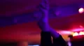 Sensual lady dancing in the night club. Female raising hands and enjoying music HD Footage