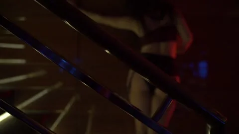 Sensual Neon Dance Behind Bars - Blurred Girl in Sexy Underwear Slow Motion Video stock 330493569