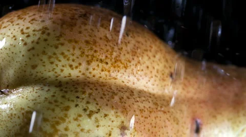 Sensual pear in the rain Stock Footage 1018402