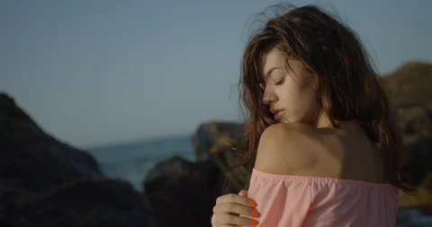 Sensual portrait. Rear close-up view of the beautiful charming brunette with Stock Footage 85938425