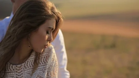 Sensual young couple in love on the background meadows. Stock Footage