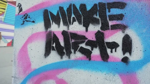Sentence “Make art" written on a wall Stock Footage 129451449