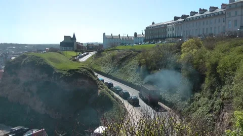Sentinel steam-powered bus climbs steephill in Whitby. Stock Footage 2923719