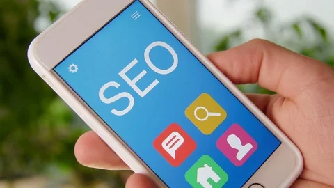 SEO concept application on the smartphone. Man uses mobile app. Stock Footage 77410364