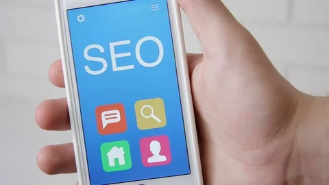SEO concept application on the smartphone. Man uses mobile app. Stock Footage 77414087
