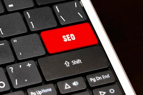 Seo on Red Enter Button on black keyboard Illustrazione stock