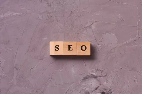 SEO (search engine optimization) acronym written in wooden cube. Search engin Stock Photos
