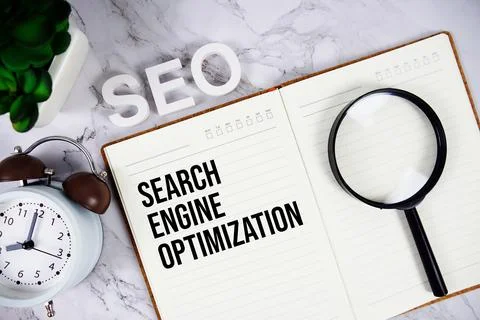 SEO - Search Engine Optimization acronym on notepad, Business concept backg.. Stock Photos