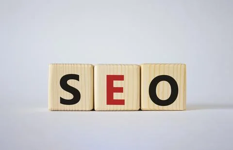 SEO - Search Engine Optimization symbol. Wooden blocks with words SEO. Beau.. Stock Photos