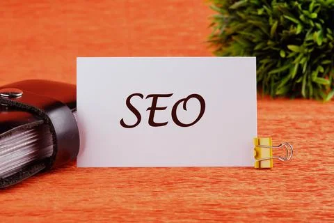SEO Search Engine Optimization symbol the inscription on the white card. Bu.. Foto stock