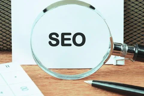 SEO Search Engine Optimization symbol an inscription was found using a magnif 写真素材