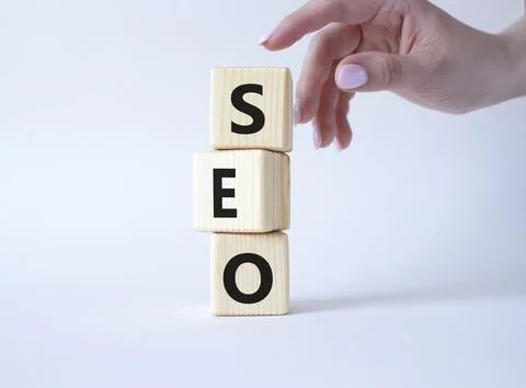 SEO - Search Engine Optimization symbol. Wooden blocks with words SEO. Busi.. 写真素材
