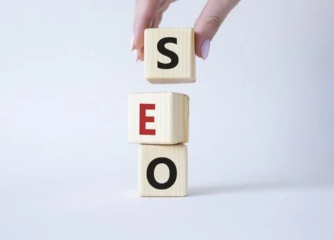 SEO - Search Engine Optimization symbol. Wooden blocks with words SEO. Busi.. 스톡 사진