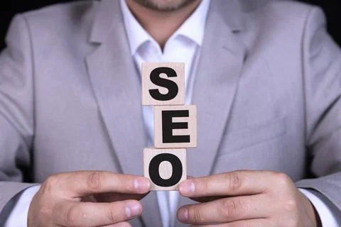 SEO search engine optimization, text is written on wooden cubes against the b 写真素材