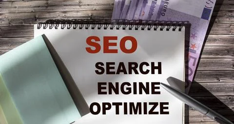 SEO SERACH ENGINE OPTIMIZE abbreviation text word written in notepad on offic 写真素材