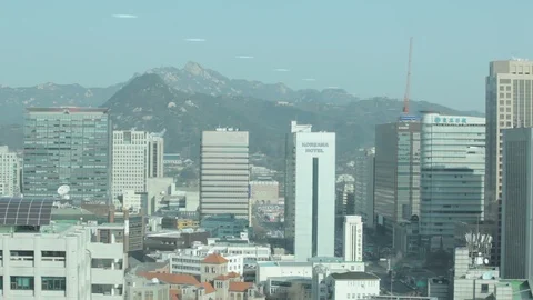 Seoul distant view of buildings and mountains beyond Stock Footage 100594183