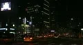 Seoul Neon Street Electronic by night, Asian Shopping, Shoppers in South Korea HD Footage