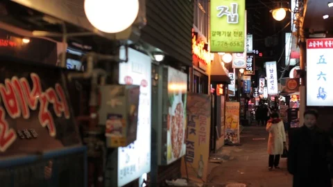 Seoul sci fi backstreet with glowing neon signs Stock Footage 100594418