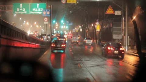 Seoul sci fi traffic at night from taxi Stock Footage 100594521