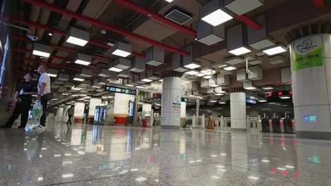 SEP 14.2026.CHINA.A low-angle view reveals a subway station concourse. Stock Footage 345470534