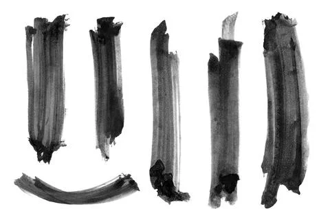 Separate black brushes on a white background. Stock Photos