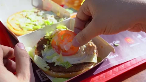 Separate burger throw away bun nutrition control Avoidance of fast carbohydrates Video stock 278201389