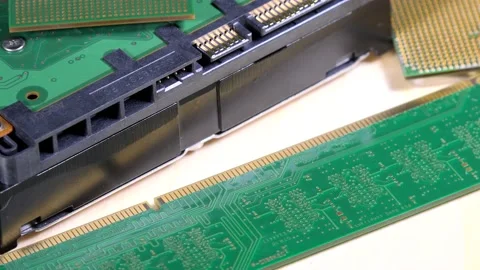 Separate computer details lie on desk hardware RAM. Modern macro technology. 4K Stock Footage 152962547