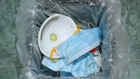 Separate garbage bin full of used protective face mask and gloves,covid19 waste Video stock 149961657