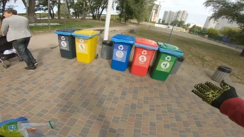 Separate garbage collection recycle POV Stock Footage 115439319