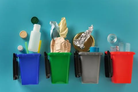 Separate garbage collection. trash cans. metal and paper, plastic and glass Stock Photos